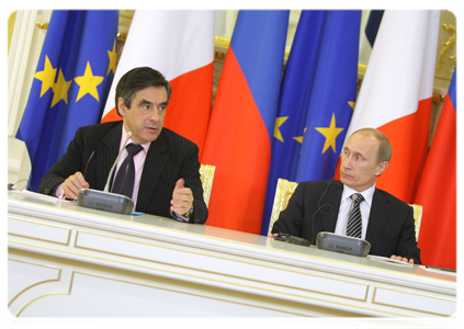 Russian Prime Minister Vladimir Putin and French Prime Minister Francois Fillon holding a joint news conference after the 15th session of the Russian-French commission on bilateral cooperation