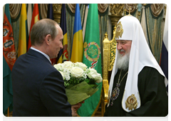 Prime Minister Vladimir Putin congratulating Patriarch Kirill of Moscow and All Russia on the anniversary of his enthronement