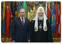 Prime Minister Vladimir Putin congratulating Patriarch Kirill of Moscow and All Russia on the anniversary of his enthronement