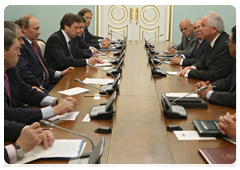 Prime Minister Vladimir Putin with Rafael Dario Ramirez Carreno, Venezuelan Energy and Petroleum Minister