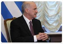Greek Prime Minister and Foreign Minister George Papandreou with Prime Minister Vladimir Putin