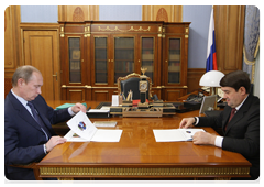 Prime Minister Vladimir Putin meets with Transport Minister Igor Levitin