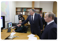 Prime Minister Vladimir Putin inspecting Central Energy Customs before attending a meeting on customs regulation