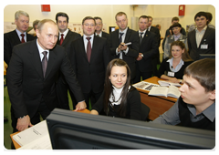 Prime Minister Vladimir Putin visiting the TNK-BP Tyumen Oil Research Centre