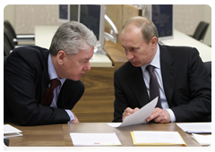 Prime Minister Vladimir Putin and Chief of Staff of the Government Executive Office Sergei Sobyanin at a meeting of the Presidium of the Presidential Council for Priority National Projects and Demographic Policy
