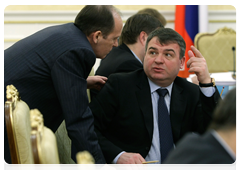 Defence Minister Anatoly Serdyukov and Chairman of the National Anti-Terrorism Committee Alexander Bortnikov before the meeting of the Government Commission on Monitoring Foreign Investment in the Russian Federation