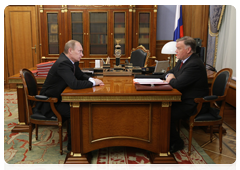 Prime Minister Vladimir Putin meets with Russian Railways President Vladimir Yakunin