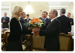 Prime Minister Vladimir Putin congratulates Minister of Health and Social Development Tatiana Golikova on her birthday