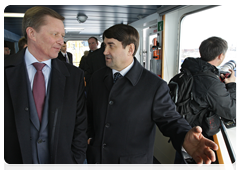 Deputy Prime Minister Sergei Ivanov and Transport Minister Igor Levitin in the captain’s cabin in the  Maersk Niamey container vessel