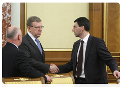 Deputy Prime Minister and Minister of Finance Alexei Kudrin and Minister of Communications and Mass Media Igor Shchegolev before the Government meeting