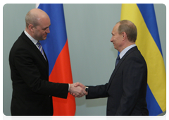 Prime Minister Vladimir Putin and Swedish Prime Minister Fredrik Reinfeldt
