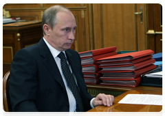 Prime Minister Vladimir Putin at a working meeting with Kaluga Region Governor Anatoly Artamonov