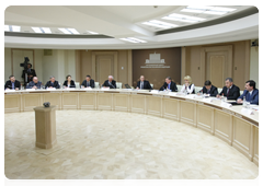 Prime Minister Vladimir Putin holding a meeting of the state commission to investigate the causes of the Tu-154 plane crash