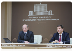 Prime Minister Vladimir Putin discussing preparations for the 2014 Olympic Games in Sochi with representatives of the Coordination Commission of the International Olympic Committee (IOC) during a video conference at the government’s situation centre