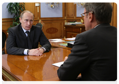 Prime Minister Vladimir Putin meets with Sberbank Chairman German Gref