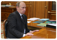 Prime Minister Vladimir Putin meets with Sberbank Chairman German Gref