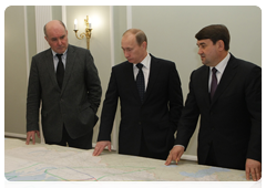 Prime Minister Vladimir Putin, Deputy Foreign Minister Grigory Karasin and Transport Minister Igor Levitin at an emergency meeting regarding Russian travellers flying to or from Europe