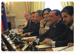 Italian Prime Minister Silvio Berlusconi at a meeting with Prime Minister Vladimir Putin
