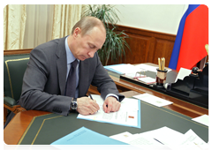 Prime Minister Vladimir Putin and Minister of Transport Igor Levitin