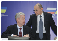Deputy Prime Minister and Chief of the Government Staff Sergei Sobyanin, left, and Head of the state nuclear corporation Rosatom Sergei Kiriyenko at a meeting of the Economic Cooperation Committee under the Russian-Ukrainian Interstate Commission