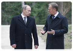 Prime Minister Vladimir Putin and Polish Prime Minister Donald Tusk visiting the Russian section of the Katyn memorial complex