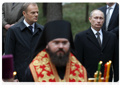 Prime Minister Vladimir Putin and Polish Prime Minister Donald Tusk visiting the Russian section of the Katyn memorial complex