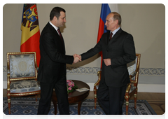 Prime Minister Vladimir Putin with Moldovan Prime Minister Vladimir Filat