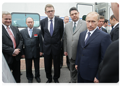 Russian Prime Minister Vladimir Putin and Finnish Prime Minister Matti Vanhanen attend the presentation of the high-speed Allegro train in Finland