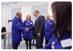 Prime Minister Vladimir Putin speaking with employees at the Russian research centre Applied Chemistry