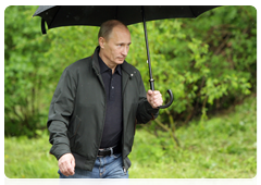 Prime Minister Vladimir Putin arriving at the War Mass Grave memorial near the village of Nevskaya Dubrovka