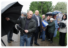 Prime Minister Vladimir Putin arriving at the War Mass Grave memorial near the village of Nevskaya Dubrovka