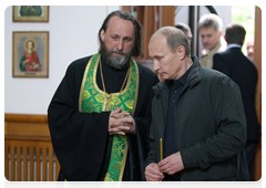 Prime Minister Vladimir Putin visiting the nearby church of Theotokos: Salvation of the Perished