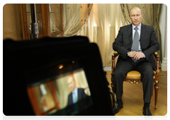 Prime Minister Vladimir Putin being interviewed by the filmmakers who made the documentary Lessons from History