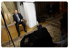 Prime Minister Vladimir Putin being interviewed by the filmmakers who made the documentary Lessons from History