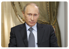 Prime Minister Vladimir Putin being interviewed by the filmmakers who made the documentary Lessons from History