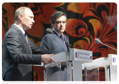 Prime Minister Vladimir Putin and French Prime Minister Francois Fillon inaugurating the Russian National Exhibition at the Grand Palais in Paris
