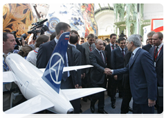 Prime Minister Vladimir Putin and French Prime Minister Francois Fillon visiting the Russian National Exhibition at the Grand Palais in Paris