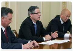 Chevron Chairman and CEO John Watson meeting with Prime Minister Vladimir Putin