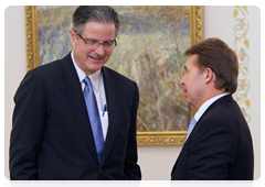 Rosneft President Sergei Bogdanchikov and Chevron Chairman and CEO John Watson