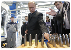 Prime Minister Vladimir Putin touring the Saturn Research & Production Centre in Rybinsk during his visit to the Yaroslavl Region