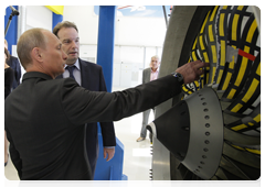 Prime Minister Vladimir Putin touring the Saturn Research & Production Centre in Rybinsk during his visit to the Yaroslavl Region