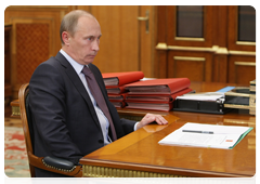 Prime Minister Vladimir Putin in a meeting with Minister of Industry and Trade Viktor Khristenko