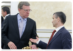 Deputy Prime Minister and Finance Minister Alexei Kudrin and Minister of the Interior Rashid Nurgaliyev before the Government Presidium meeting