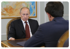 Prime Minister Vladimir Putin meeting with head of the Federal Insurance Supervision Service Alexander Koval