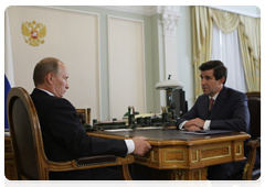 Head of the Federal Insurance Supervision Service Alexander Koval at a meeting with Prime Minister Vladimir Putin