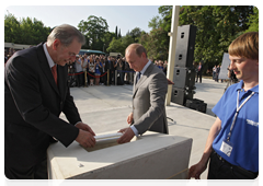Prime Minister Vladimir Putin and President of the International Olympic Committee (IOC) Jacques Rogge taking part in the foundation stone ceremony for the Russian International Olympic University