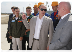 Prime Minister Vladimir Putin touring the construction sites of facilities for the 2014 Winter Olympics in Sochi