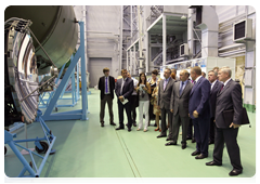 Prime Minister Vladimir Putin inspecting a test and control station at the Energia Rocket and Space Corporation