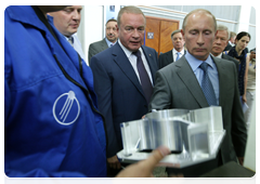 Prime Minister Vladimir Putin inspecting a test and control station at the Energia Rocket and Space Corporation