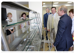 Prime Minister Vladimir Putin visiting a community centre in the village of Tulinovka, Tambov Region
